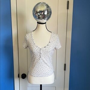 Elegant White Floral Button-Up Tee